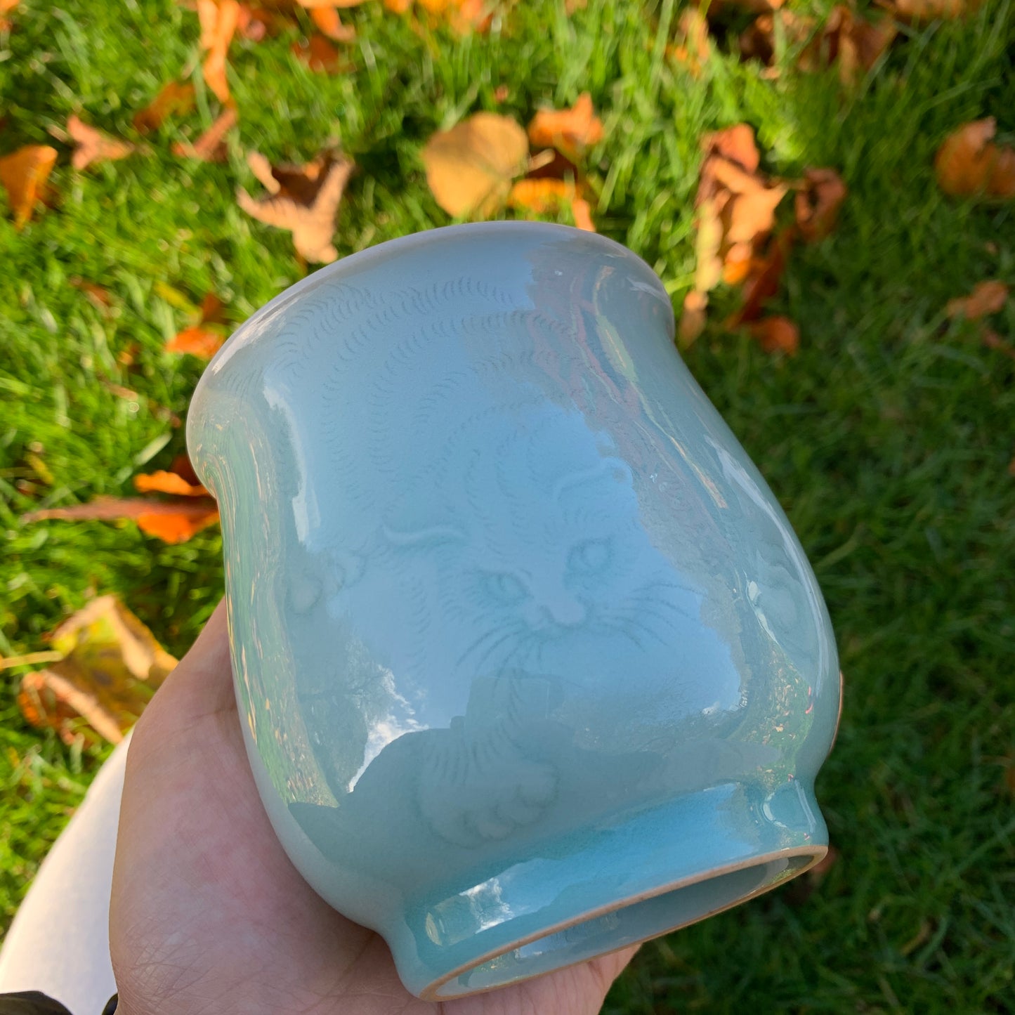 Traditional Chinese Celadon Cup with Hand Carved Cat Pattern